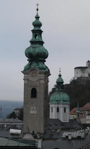 Church in foreground has onion type dome. Church in background has normal dome.