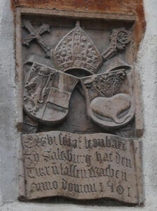 Plaque with shields and bishop’s mitre, cross, and shepherd’s crook.  Dated 1401