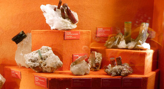 Various samples of red/orange tourmaline crystals