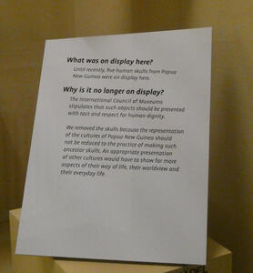 Placard saying an exhibit has been removed and explaining why