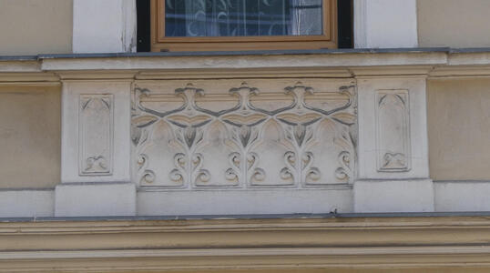 Carving on a stone windowsill.