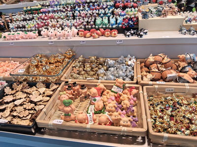 Trays of small ceramic toys.