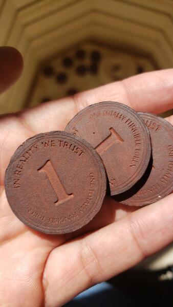 Several tokens with number side up