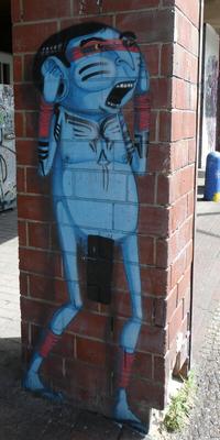 Blue-skinned indigenous person shouting