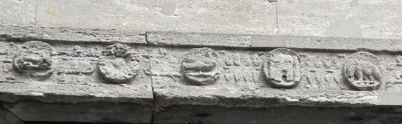 Badly weathered circular carvings