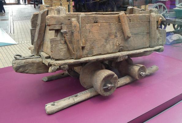 Wooden mining cart that runs on wooden rails