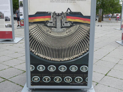 Typewriter with ribbon in colors of German flag (Black/Red/Yellow)