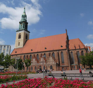church with flowers in foreground