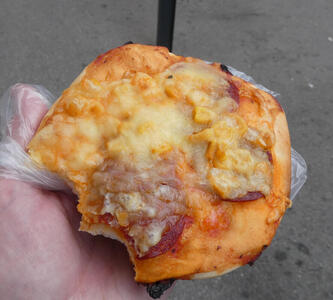 pizza with pepperoni and corn