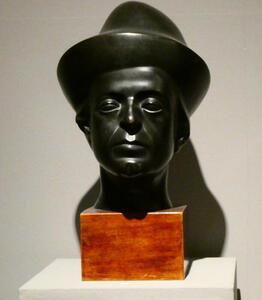 sculpture man in hat