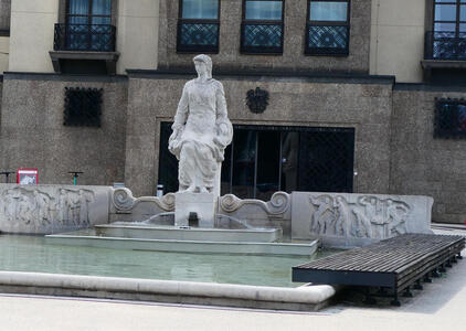statue in center of fountain