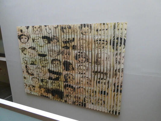 artwork of many faces