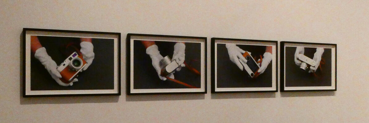 pictures of person handling a camera
