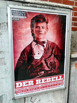 poster the rebel play