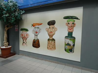 whimsical figures with vegetables on their heads
