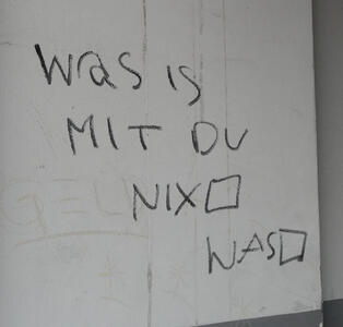 Graffiti: Was is mit du ; beneath it, “checkboxes” labeled NIX and WAS
