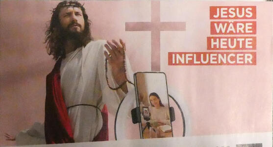 whitebread Jesus; in lower right, a woman recording on a cell phone