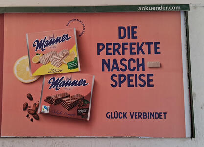 Ad for Manner wafers. Die Perfekte Nasch-speise. The hyphen in Naschspeise is a picture of a wafer.