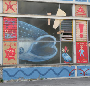 At left, a large fish. At right, outline of a human being filled 70% with water; text: 70% ocean in you.