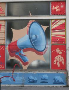 megaphone with blue horn and red base