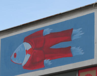 Fish in red suit with red tie