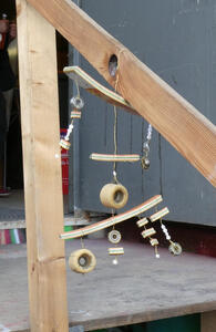 Children’s mobile hanging on a stair railing