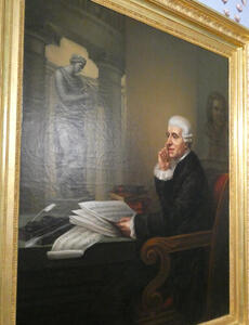 Portrait of Haydn. In his left hand are sheets of music. His right hand is resting on his cheek.