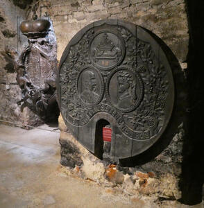 Large wine barrel with carved portrait of emperor and empress