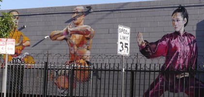 Wall art showing three martial artists