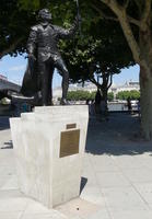 Statue of Sir Laurence Olivier in Shakespearean garb