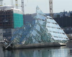 Abstract sculpture in water near opera house