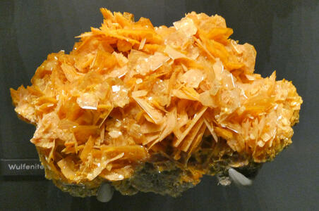 Dark yellow spiky mineral sample of wulfenite