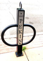 Bicycle rack with legend “Bike Pekin”