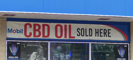 Sign: Mobil CBD Oil Sold Here