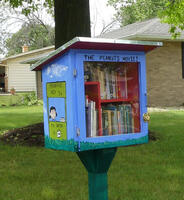 Free library cabinet decorated with images from Peanuts comic strip