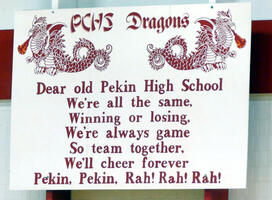 Dear old Pekin High School / We're all the same / Winning or losing, / we’re always game / So team together, / We’ll cheer forever / Pekin, Pekin, Rah! Rah! Rah!
