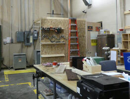 Construction area with tools on wall