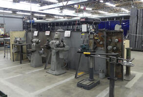 Macine shop with drills and sanders.