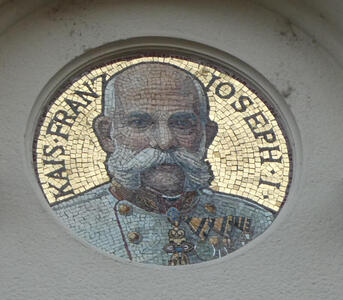 Mustached man with medals on clothing. Text: Kais. Franz Joseph I