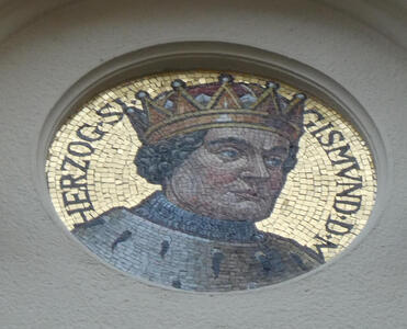 Mosaic of man with crown. Text: Herzozg Sigismund D M