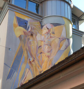Pastel colored painting of two people kissing.