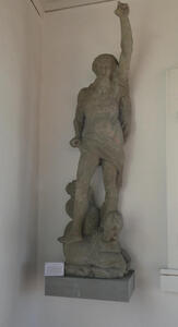 Statue of Neptune with arm upraised