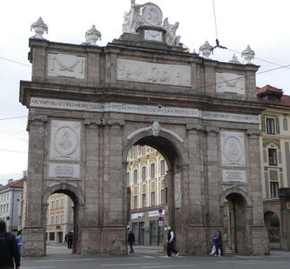 Triumphal arch with Latin inscription in stone