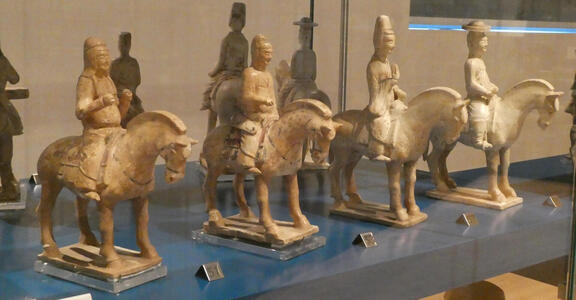 four soldiers on horseback