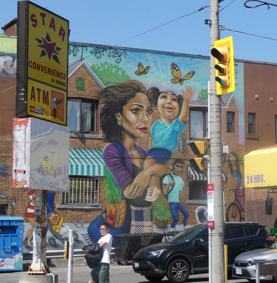 wall mural woman holding child