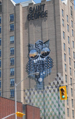 owl mosaic on building