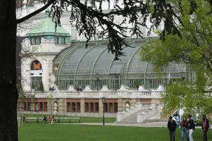 Building with curved glass half-dome window