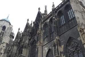 Back of church with black, weathered stone