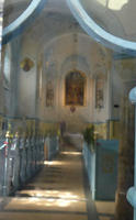 Interior of church with pews and altar