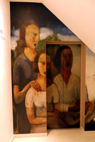 Painting of three women on elevator doors